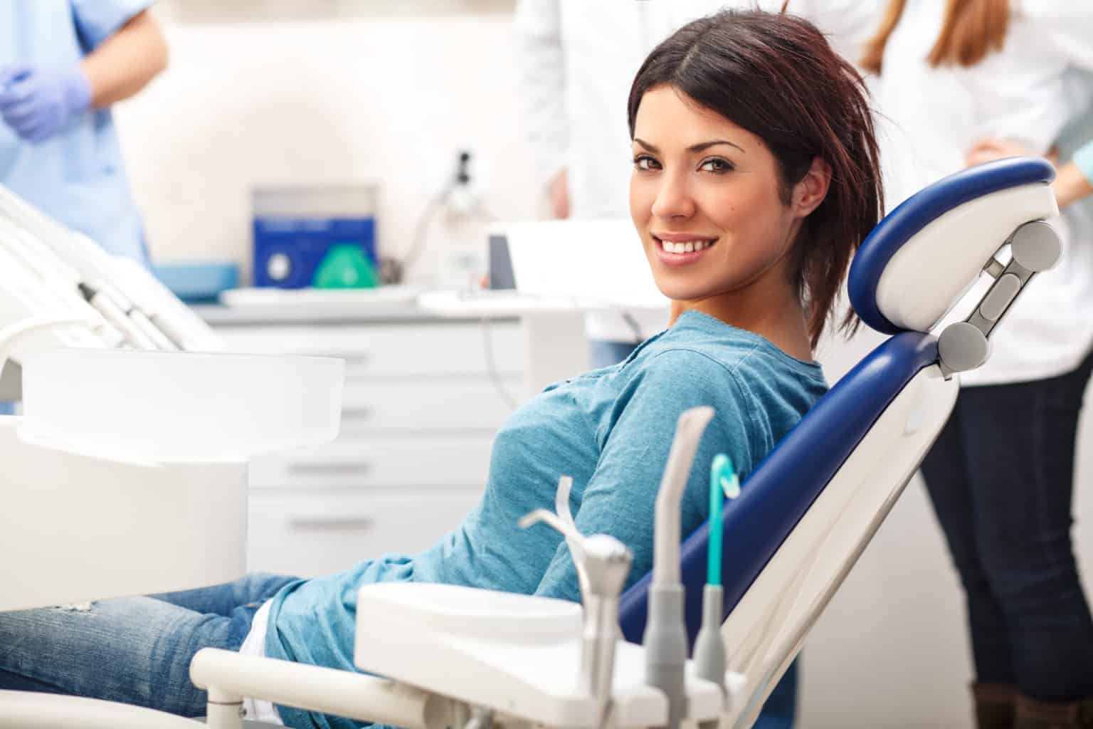 Woman sitting in dentist's chair